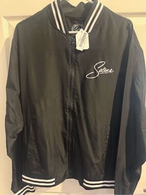 Official Selena Women's Black Bomber Jacket with White Trim, new, size Large